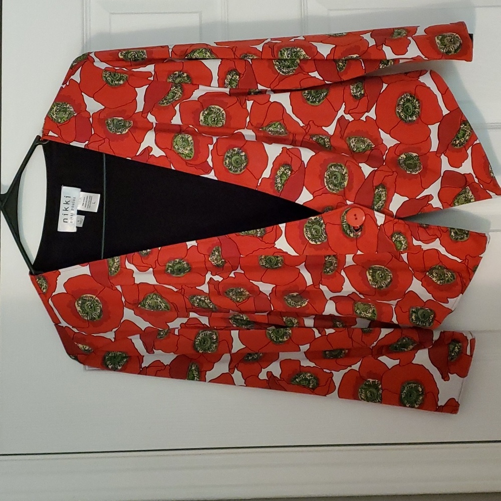 Reversible Jacket with Beautiful floral print. By Nikki Poulos Size L.